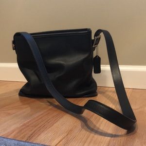 Authentic classic Coach leather bag. 8 1/2 inches in height 10 inches in width.